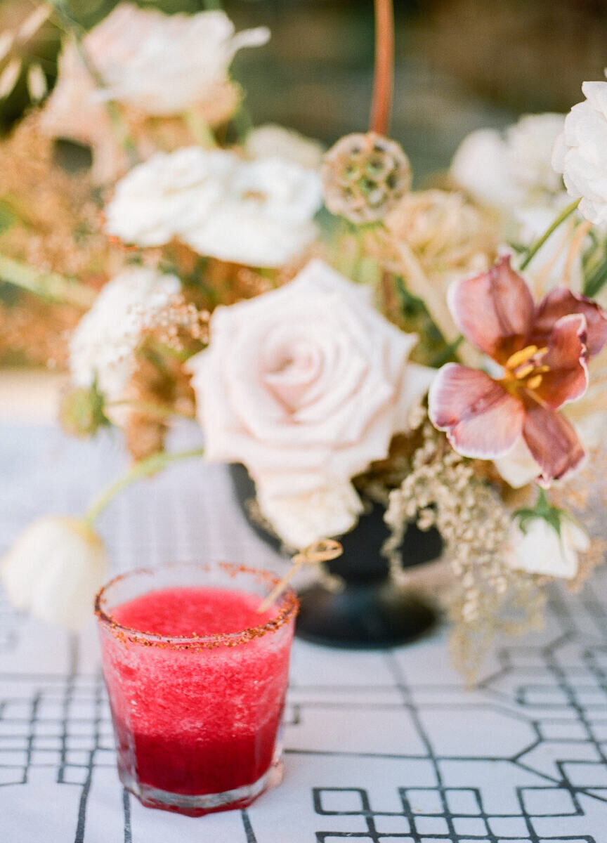 A margarita with salted rim at a cocktail hour of an outdoor wedding in Mexico.